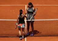 .Naomi Osaka greets Misaki Doi at the net after defeating the latter.